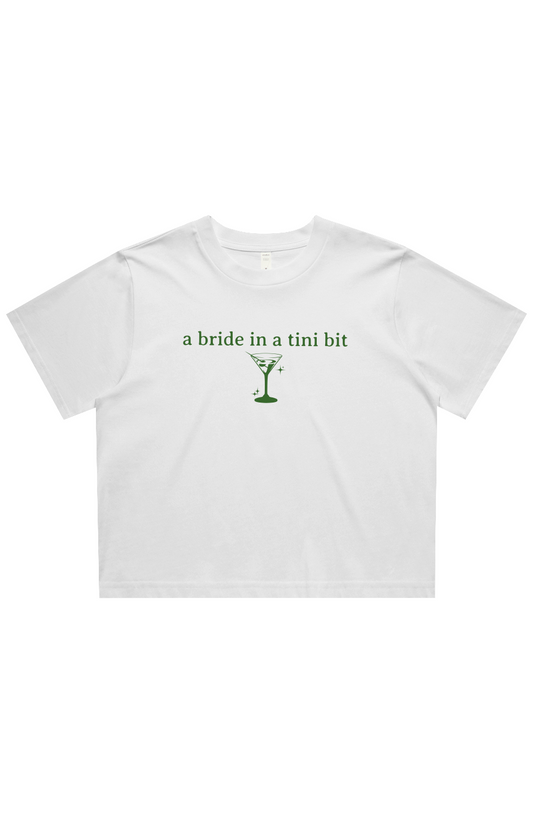 a bride in a tini bit cropped tee